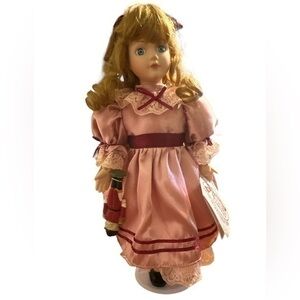 Doll 13” the San Francisco music box company 
Nutcracker music box doll windup o